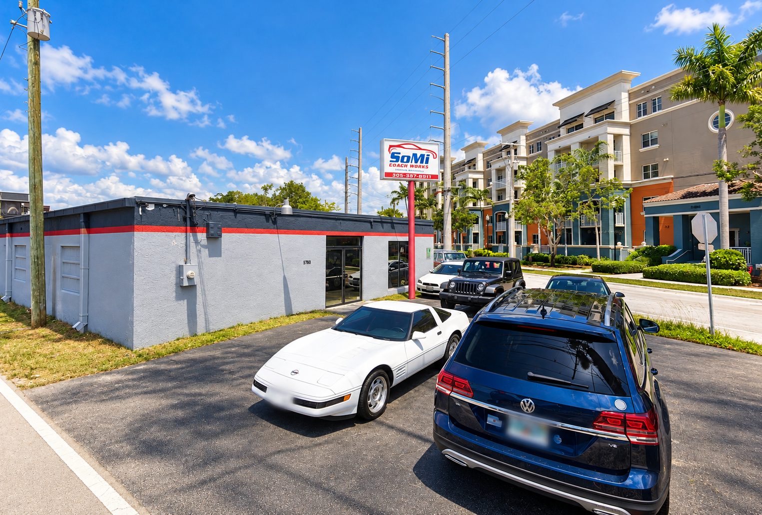 South Miami Coach Works exterior and front parking lot at 5780 SW 68th St